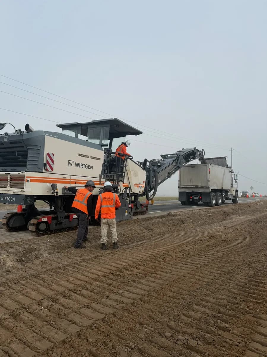 Professional paving crew at work